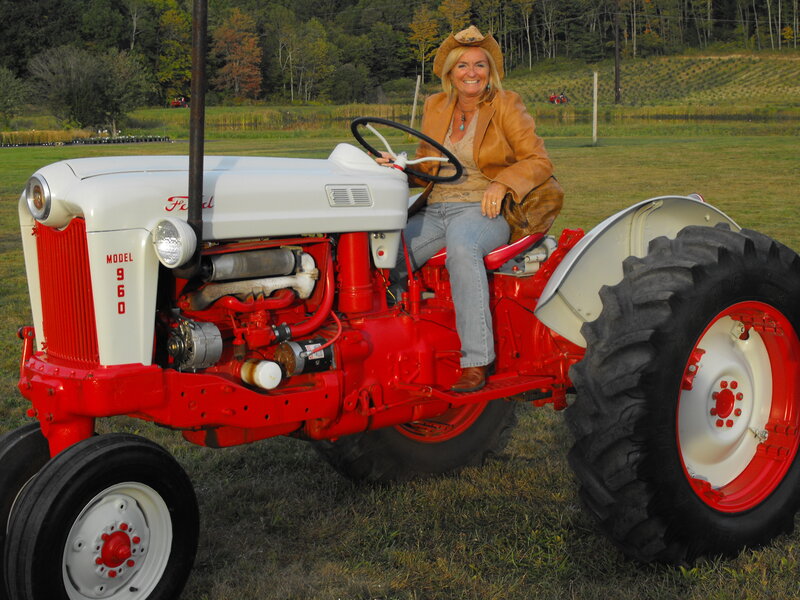 Woman on Red Tractor — Serene