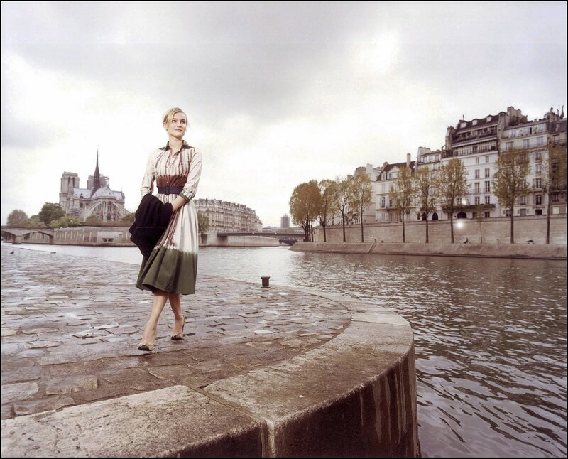 woman on riverbank in paris