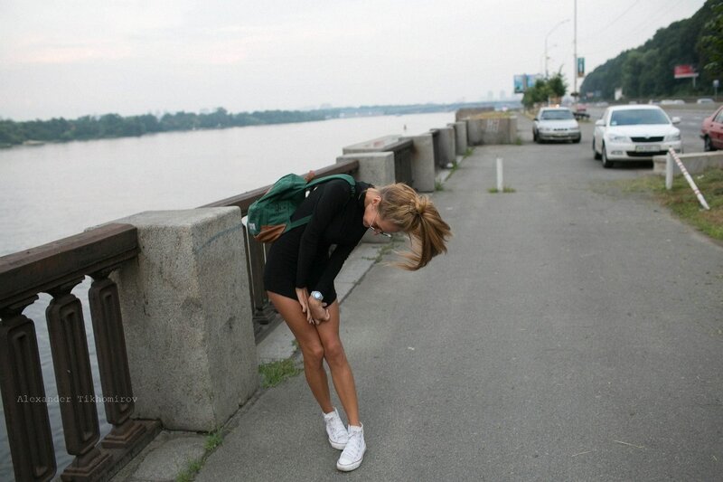 Woman on riverside path