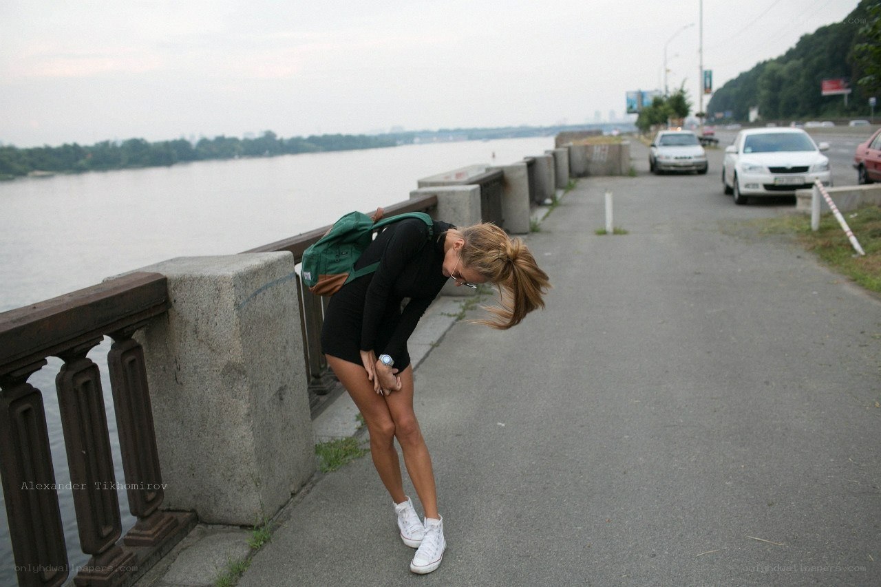 Woman on riverside path