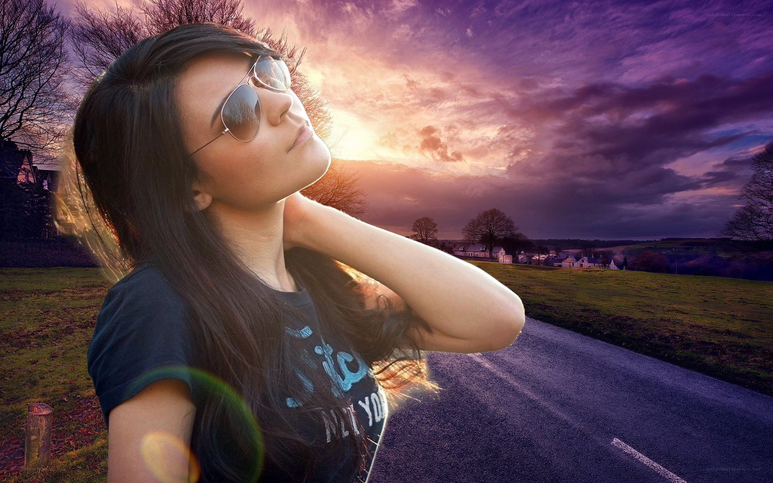 woman on road at sunset