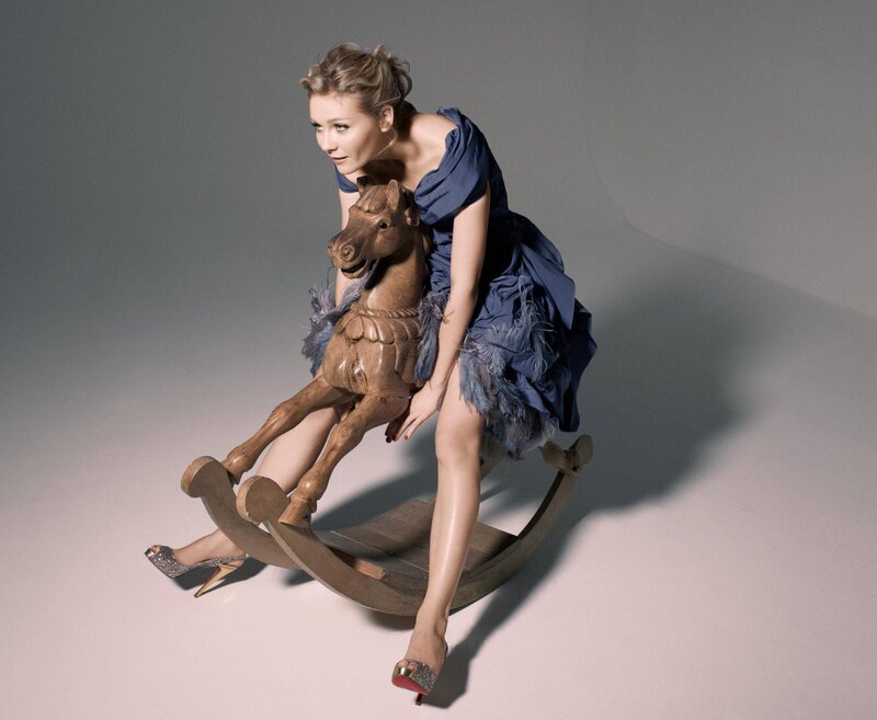 Woman on Rocking Horse — Blue