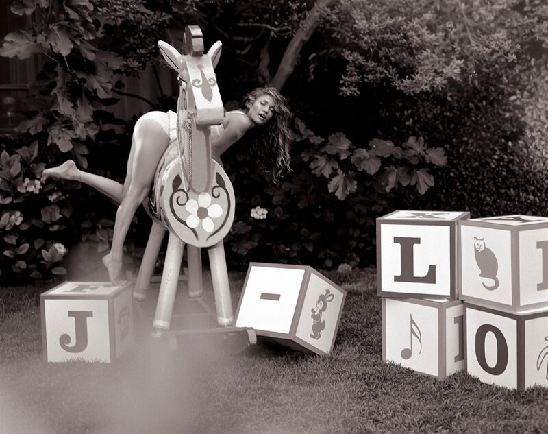 Woman on rocking horse with blocks