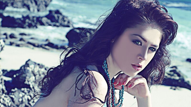 woman on rocky beach