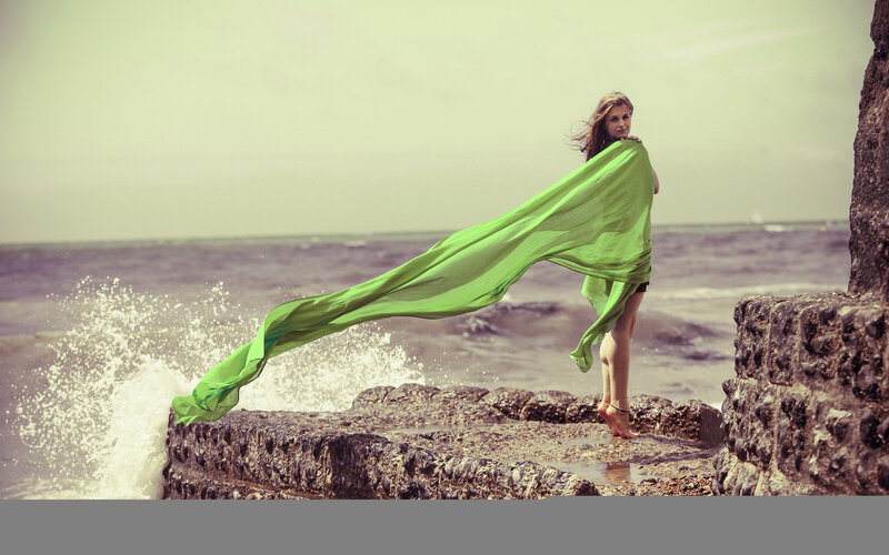 Woman on Rocky Pier — Green