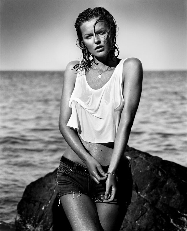 woman on rocky shore