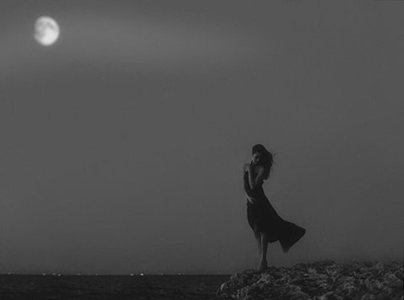 Woman on Rocky Shore — Black, Dramatic, Night