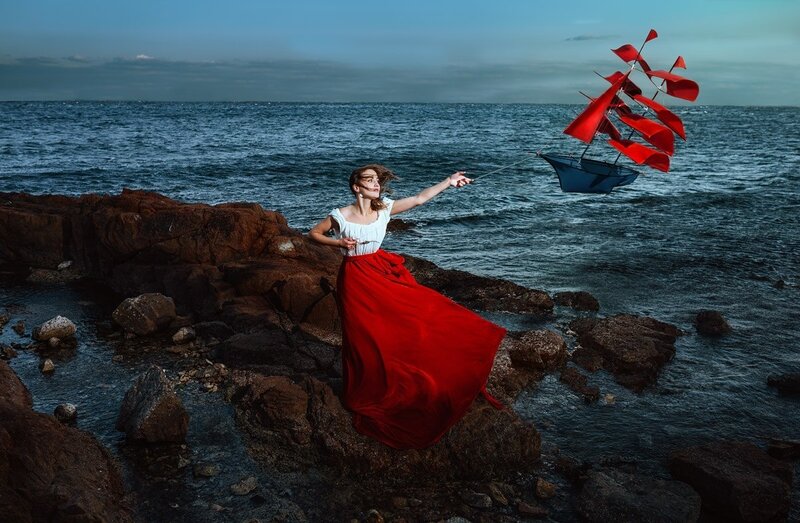 Woman on Rocky Shore — Red