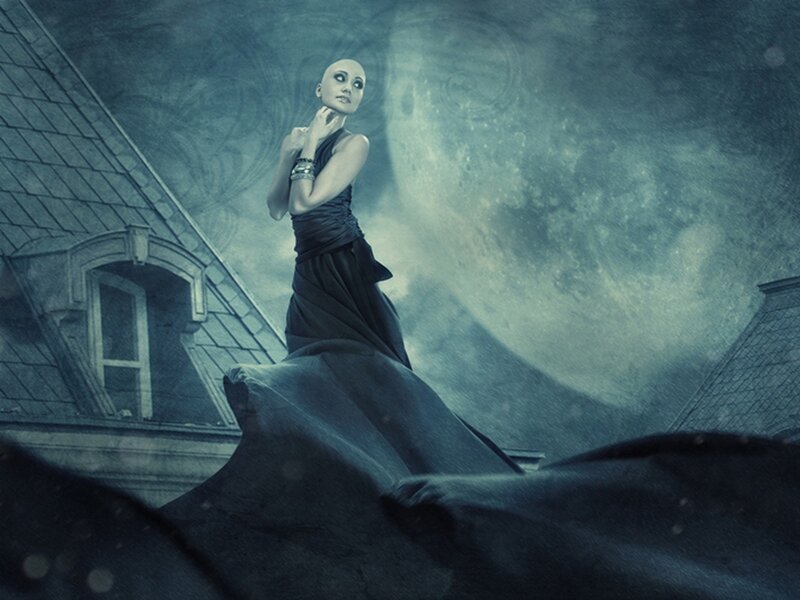 woman on rooftop at night