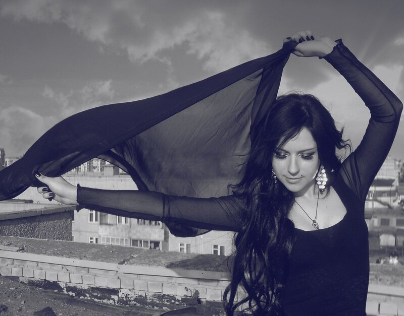Woman on Rooftop — Black, Dramatic, Afternoon
