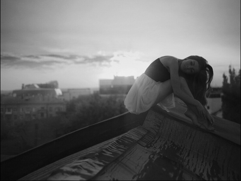 Woman on Rooftop — Black, Dramatic, Sunset