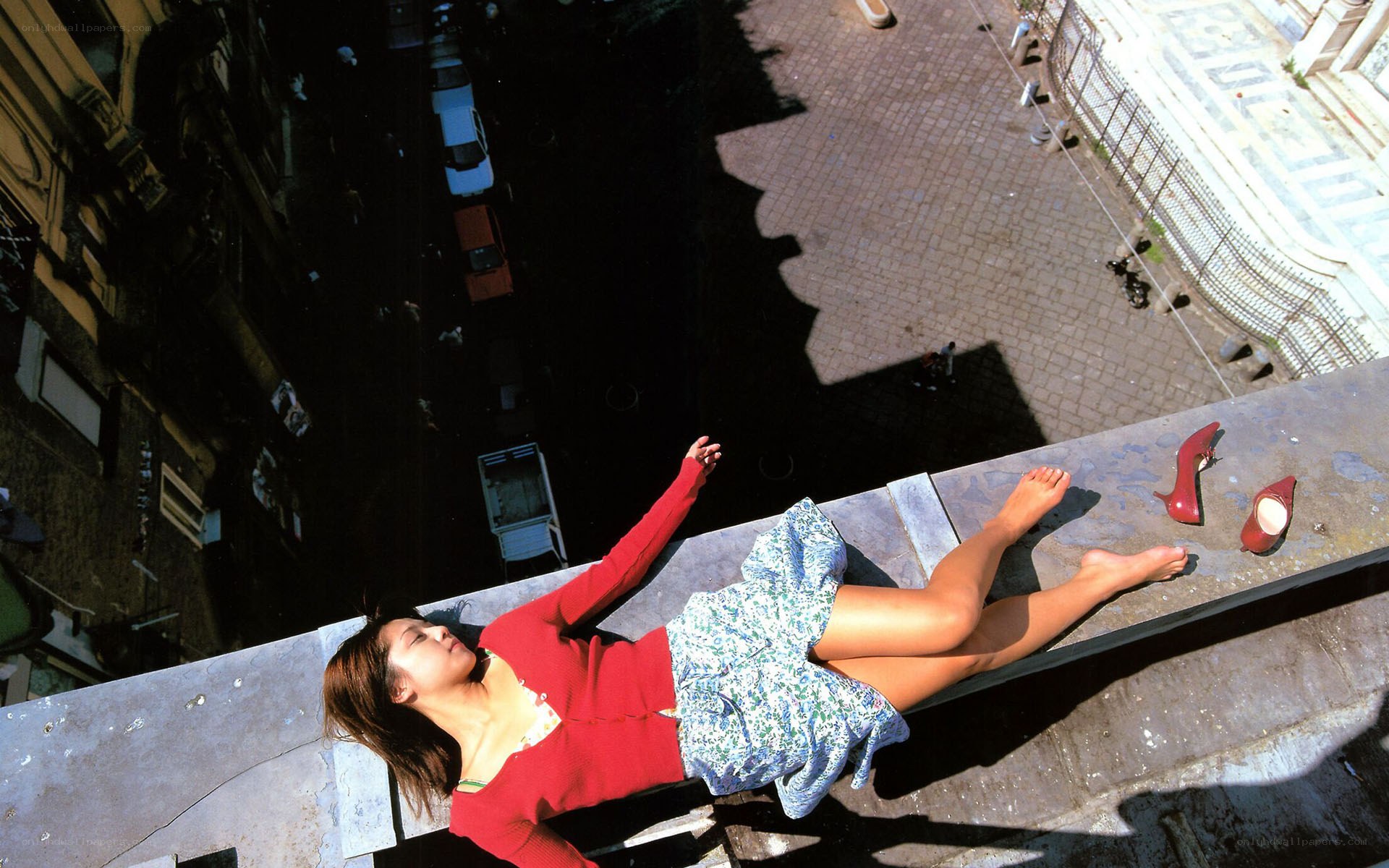 Woman on rooftop edge