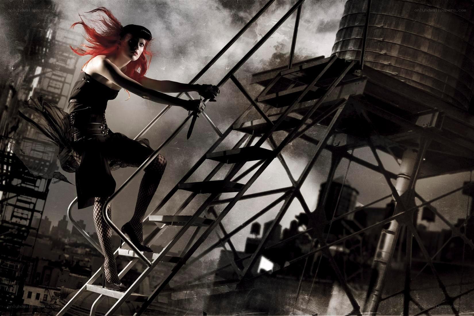 Woman on rooftop ladder