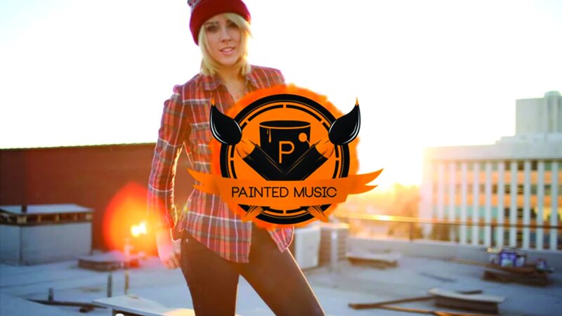 woman on rooftop with logo