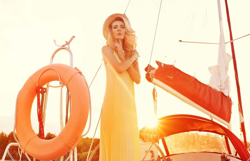 Woman on Sailboat — Yellow