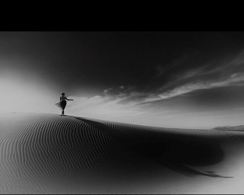 Woman on Sand Dune — Black