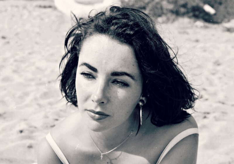 Woman on Sandy Beach — Black, Contemplative