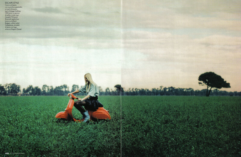 Woman on scooter in field