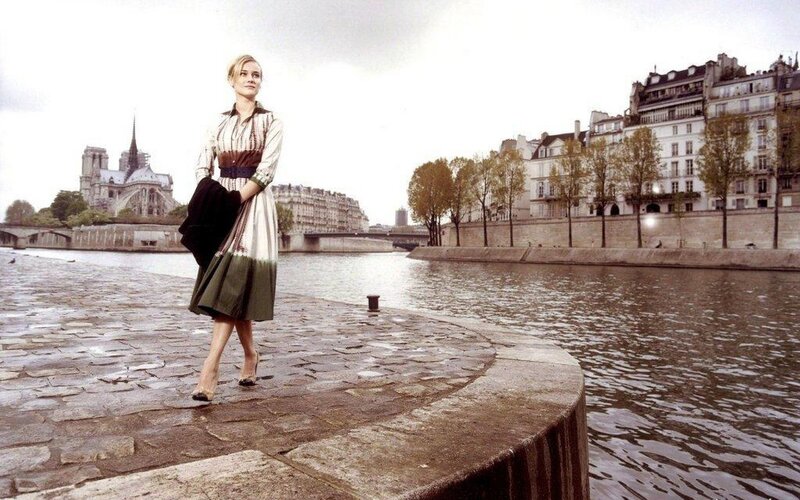 Woman on Seine with Notre-Dame