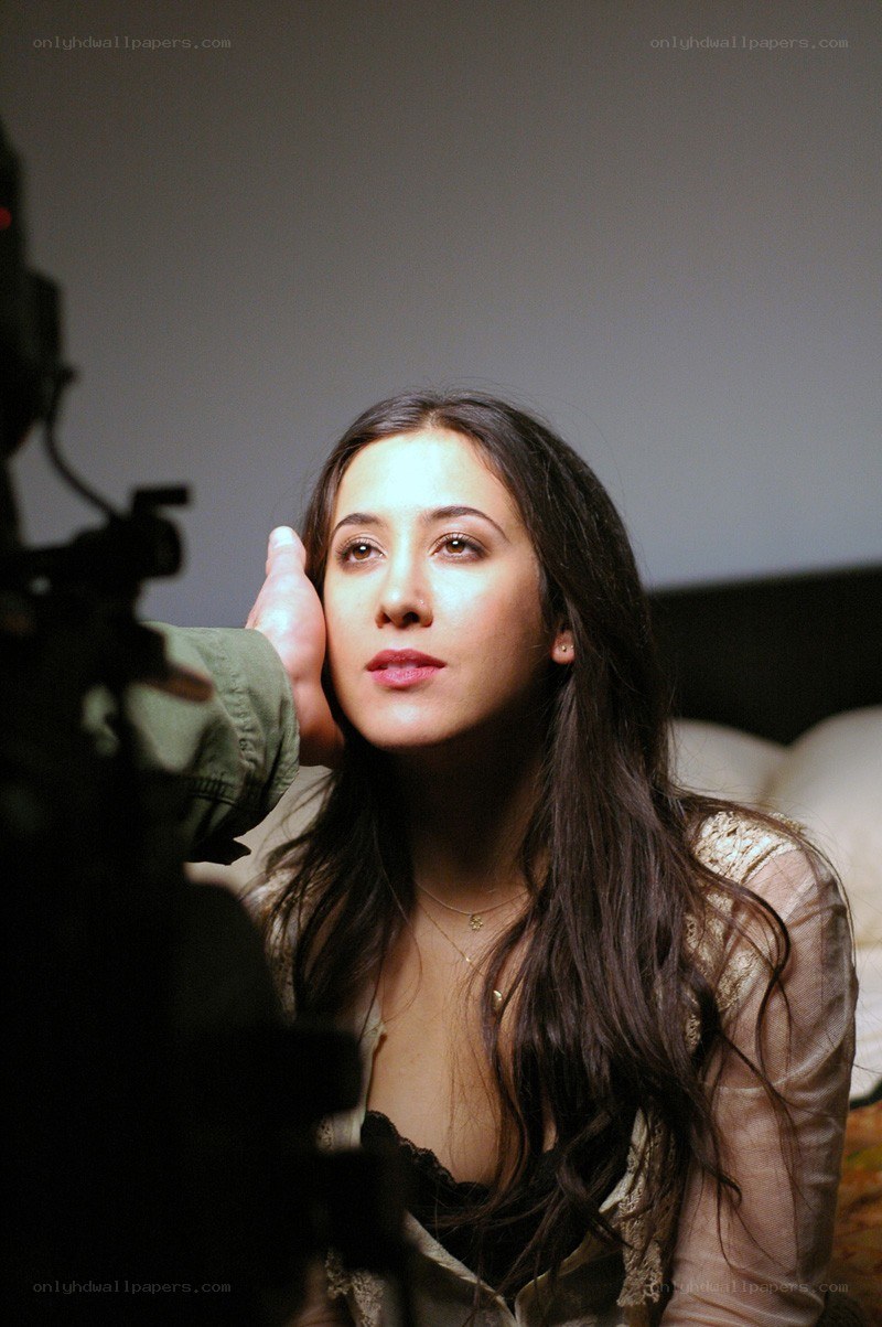 woman on set with camera