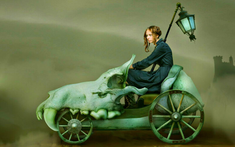 Woman on Skull Cart