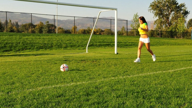 Woman on Soccer Field — Green