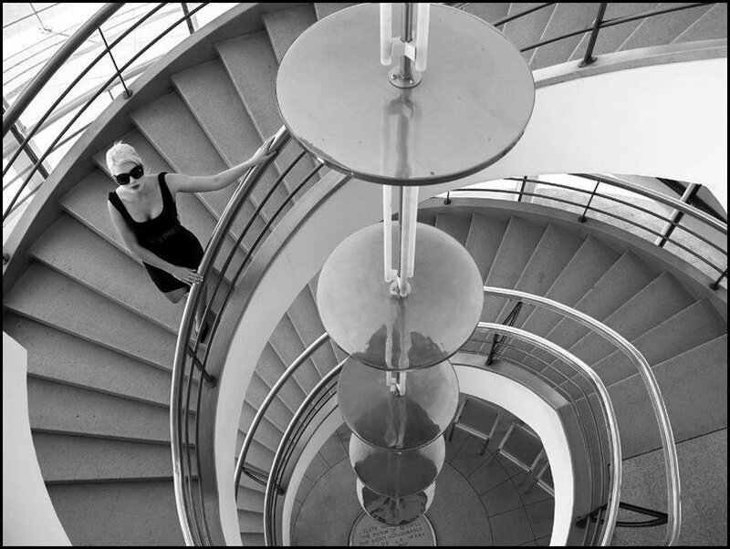 Woman on Spiral Staircase — Black