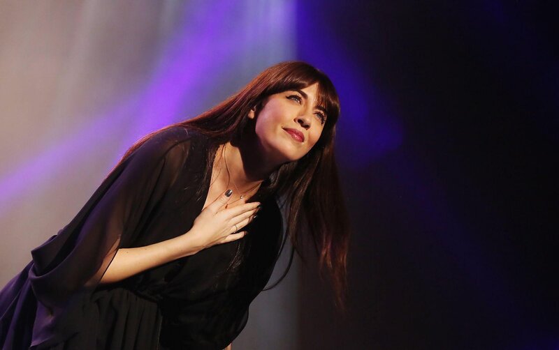 Woman on Stage — Black