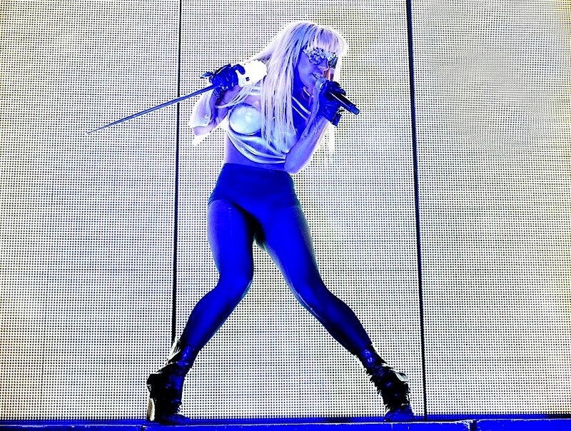 Woman on Stage Singing — Blue
