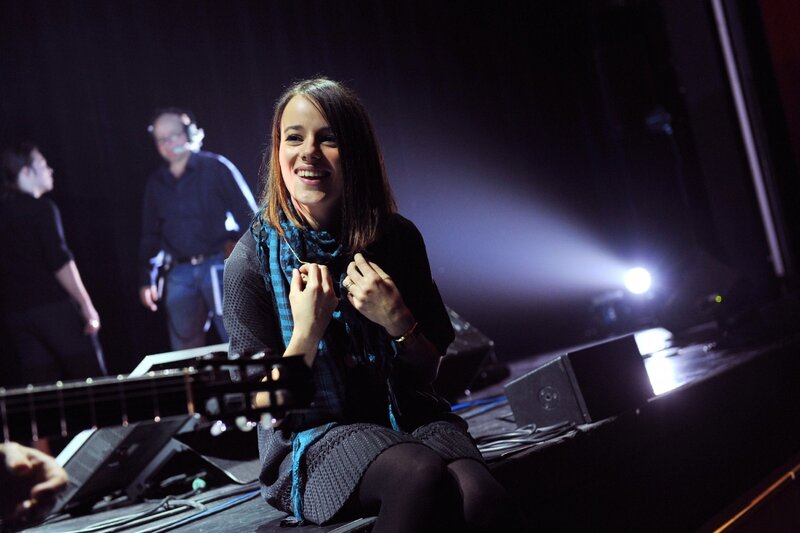 Woman on Stage Smiling — Black