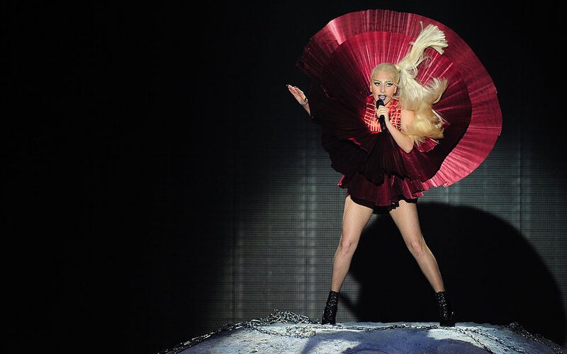 Woman on Stage with Fan