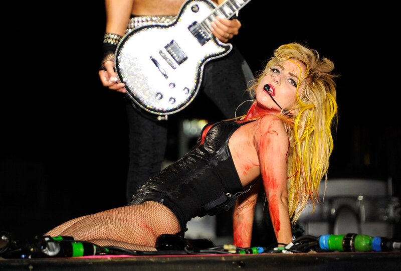Woman on Stage with Guitar