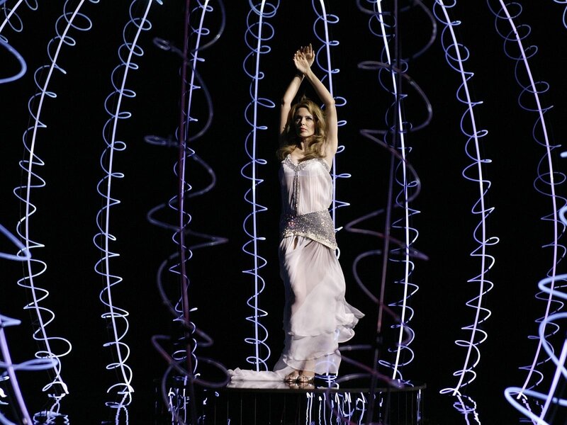 Woman on Stage with Lights — White