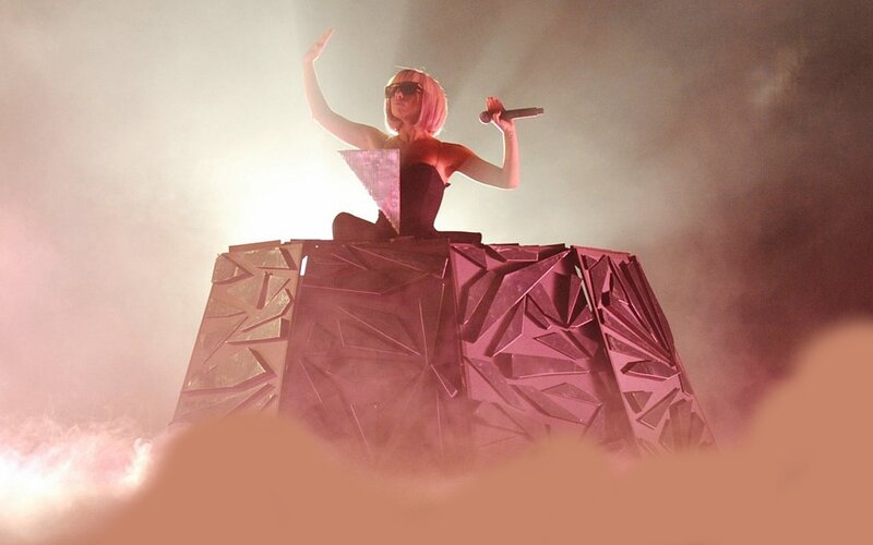 Woman on Stage with Microphone — Pink