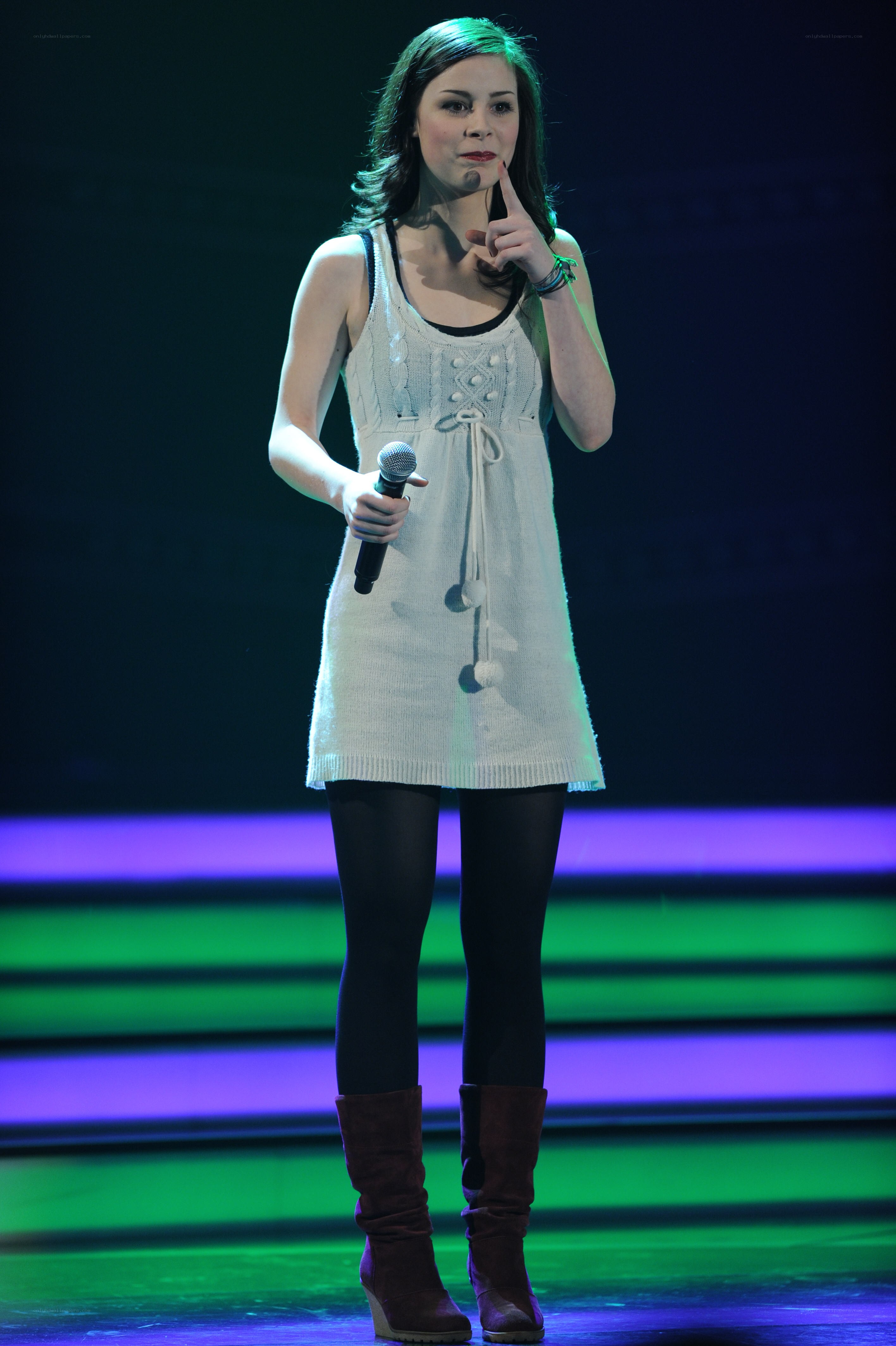 Woman on stage with microphone