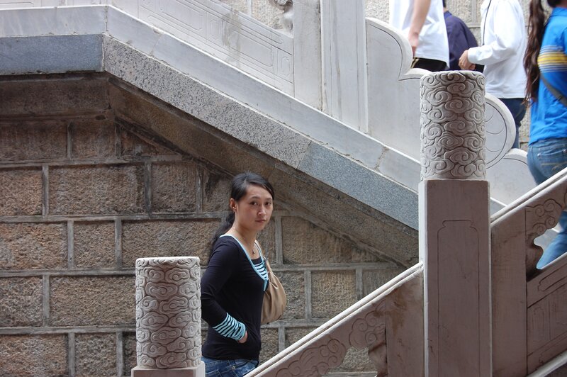Woman on stone staircase