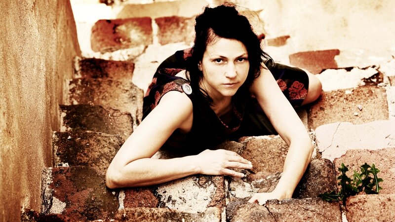 woman on stone steps