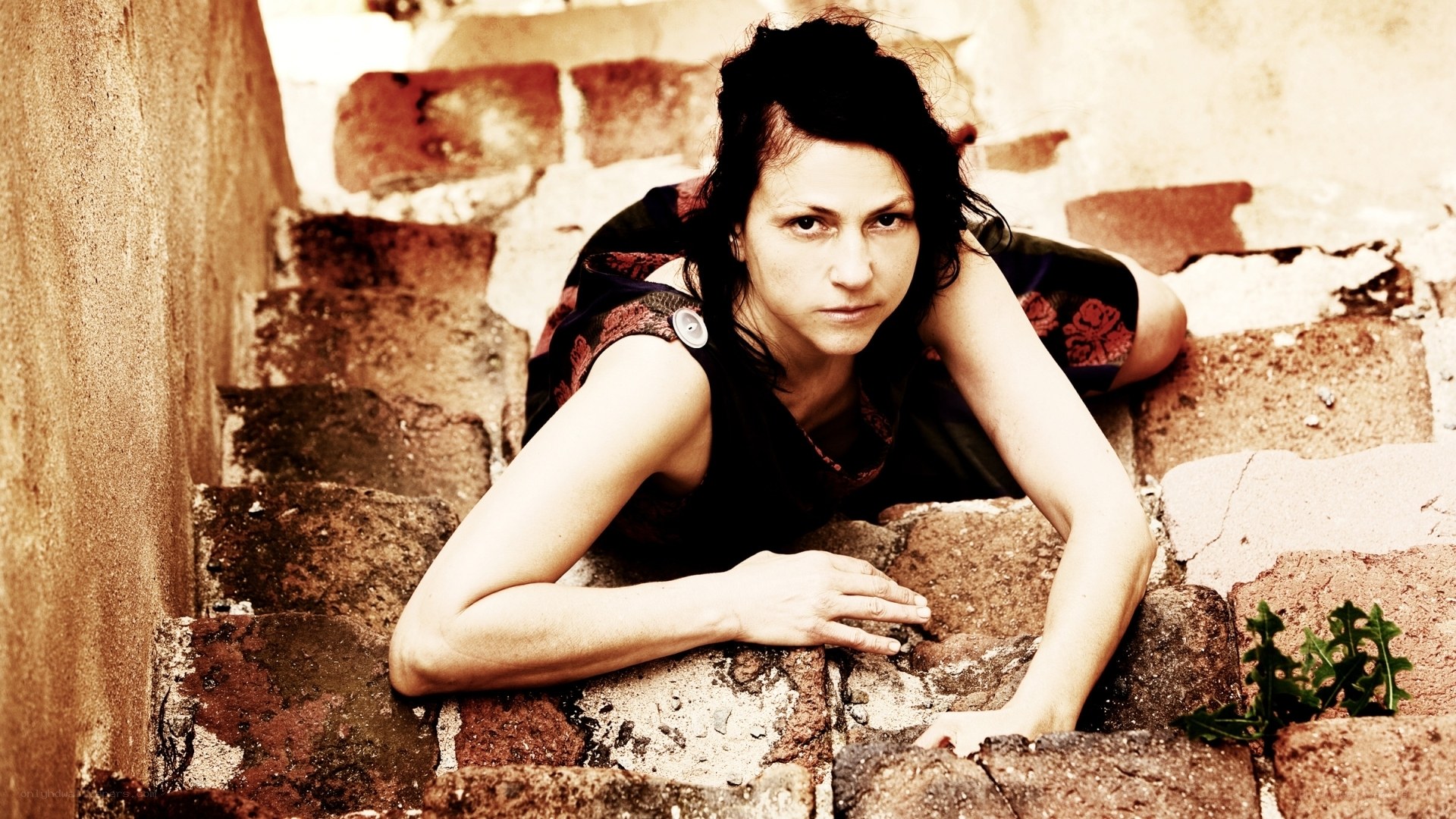 woman on stone steps