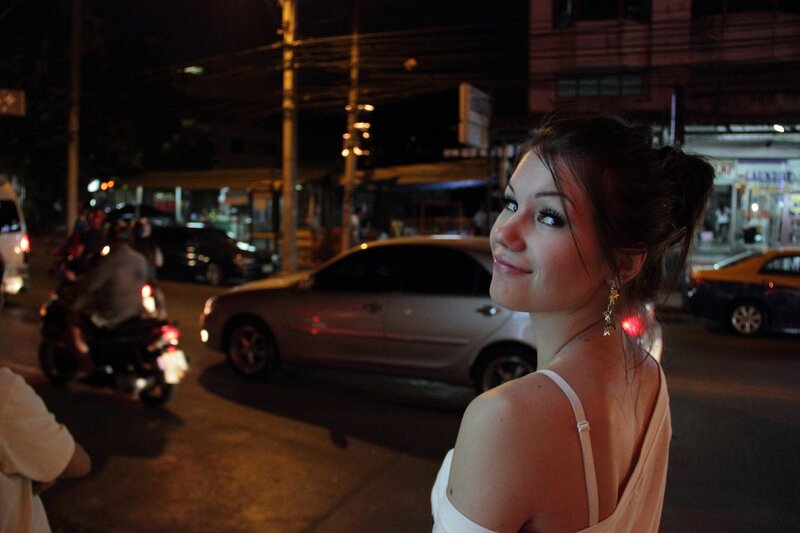 Woman on Street at Night