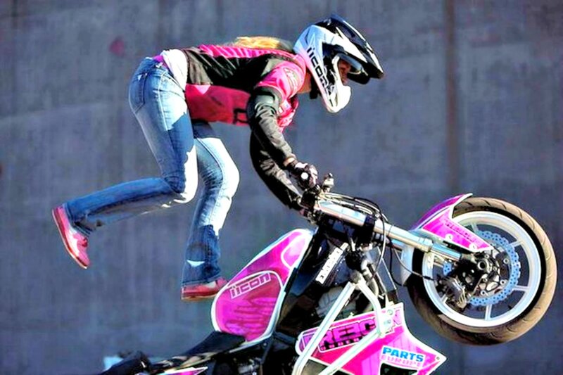 Woman on Stunt Motorcycle