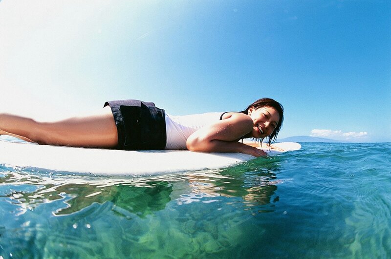 woman on surfboard in ocean