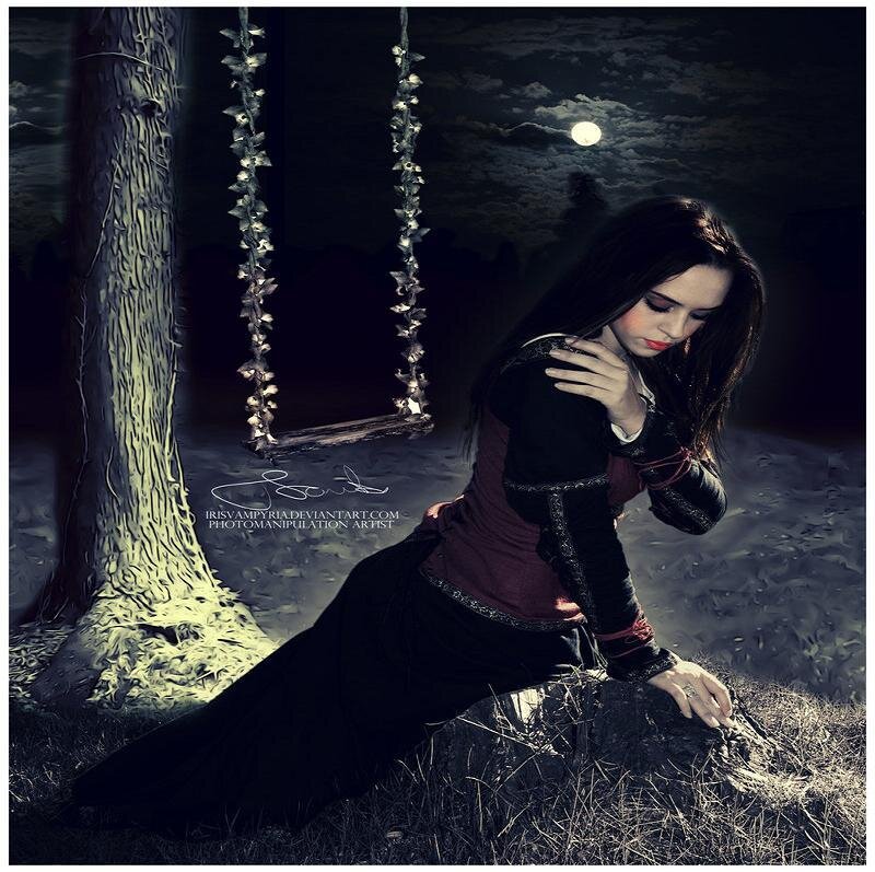 woman on swing at night