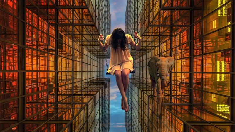 Woman on Swing Between Buildings