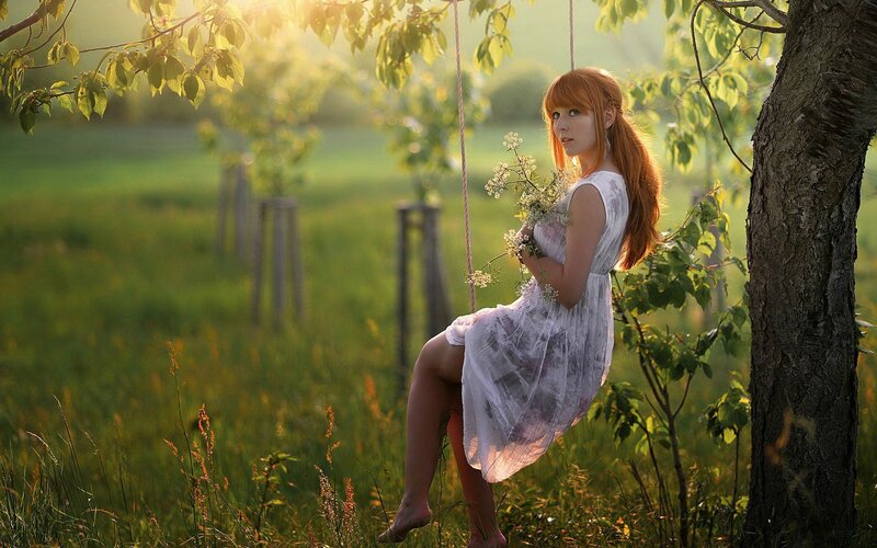 Woman on Swing — Green, Serene, Sunset