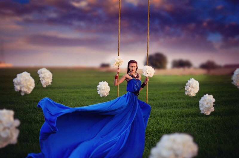 Woman on Swing in Field — Blue