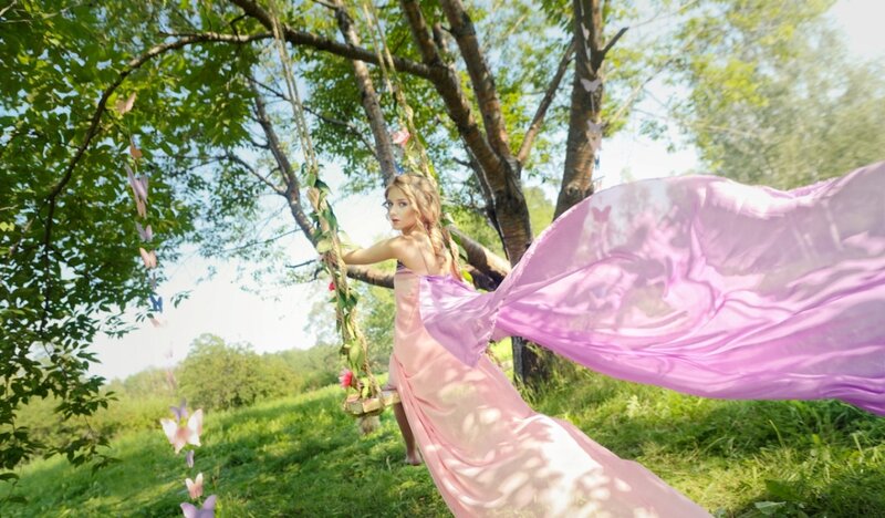 Woman on Swing in Park — Pink