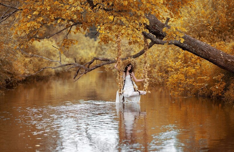 Woman on Swing in River