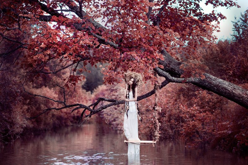 Woman on Swing under Tree — Red, Serene