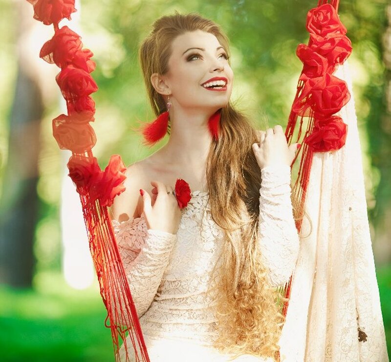 Woman on Swing — White, Serene, Afternoon, Photograph, Red Flowers