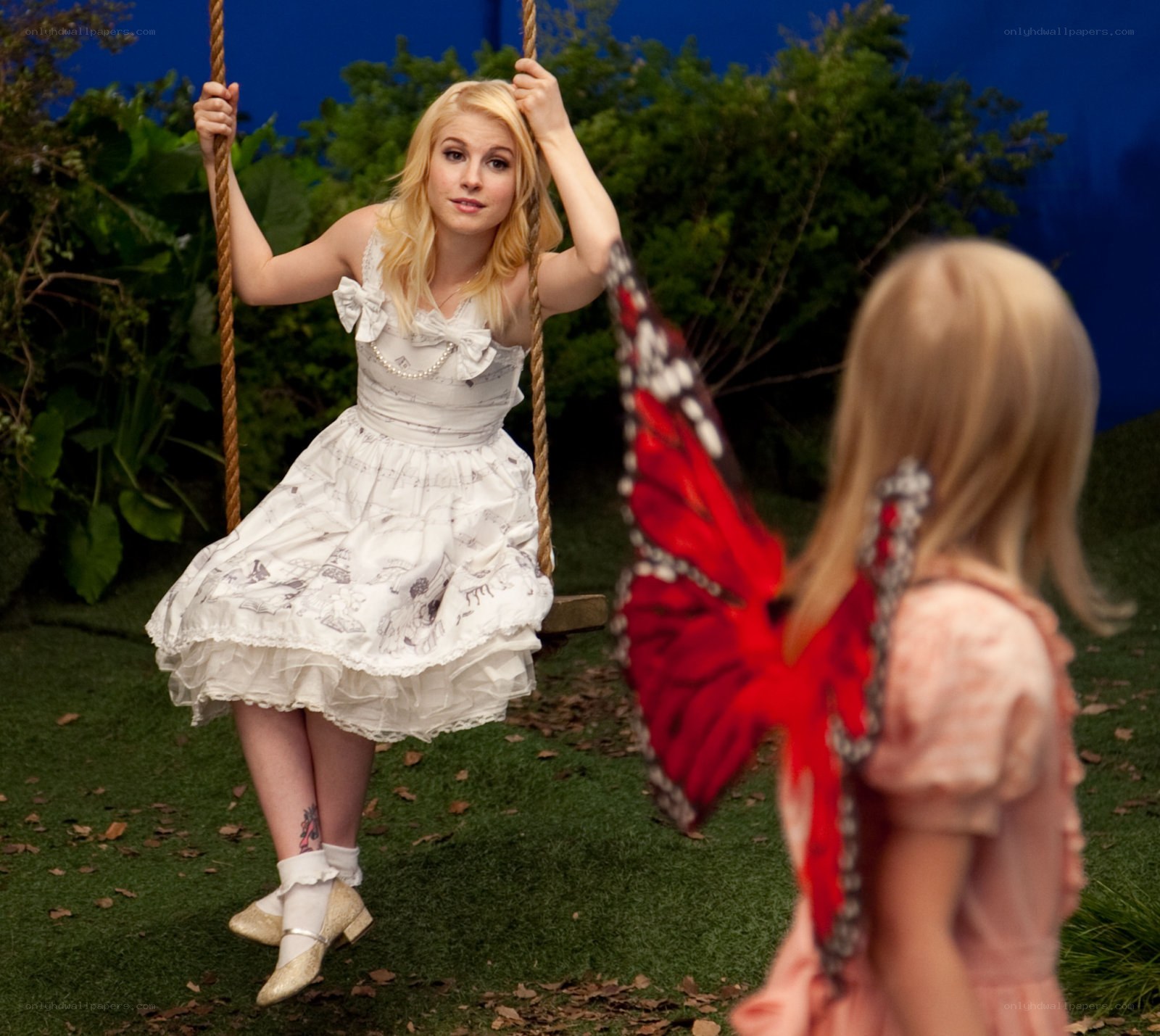 Woman on swing with child